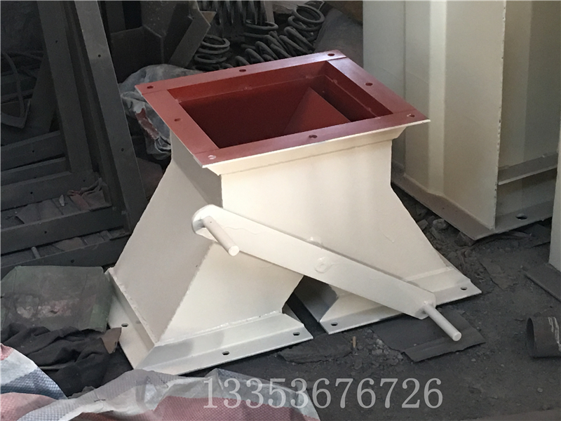 粉煤灰板（bǎn）鏈鬥式提升（shēng）機出料口分料器